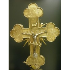 Cross buttony crucifix on a chalice